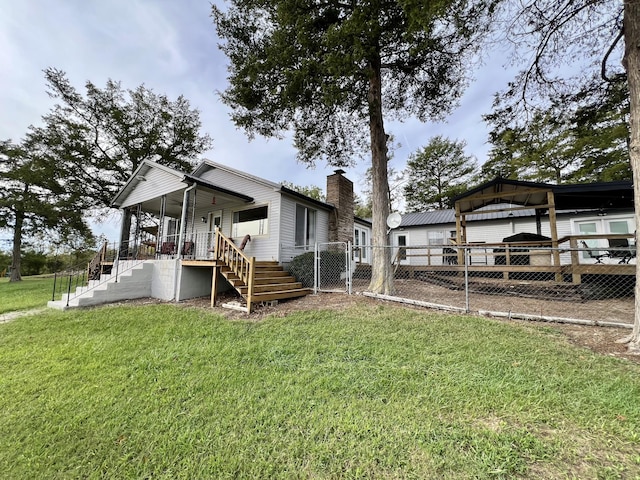 21937 Lake Rd Unit M12, Cassville, MO 65625 - rear view of property with a chimney and stairs