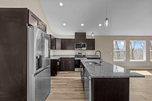 1186 Emory Creek Blvd, Branson, MO 65616 - kitchen featuring stainless steel appliances, a sink, light wood-style floors, dark brown cabinets, and recessed lighting