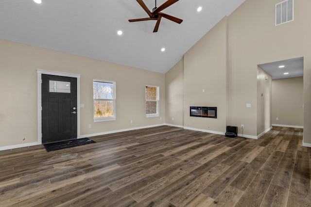 1186 Emory Creek Blvd, Branson, MO 65616 - unfurnished living room featuring high vaulted ceiling, wood finished floors, a ceiling fan, baseboards, and a glass covered fireplace