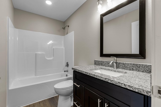 1186 Emory Creek Blvd, Branson, MO 65616 - full bath featuring vanity, toilet, tub / shower combination, and wood finished floors