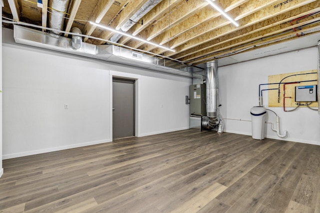 1186 Emory Creek Blvd, Branson, MO 65616 - finished basement featuring wood finished floors, a water softener system, and baseboards