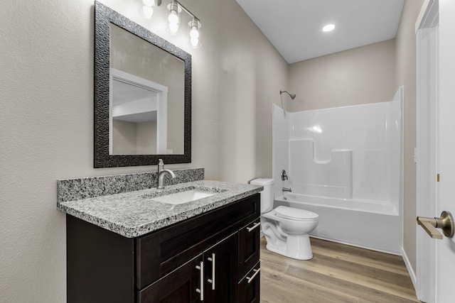 1186 Emory Creek Blvd, Branson, MO 65616 - full bath featuring toilet, vanity, bathing tub / shower combination, and wood finished floors