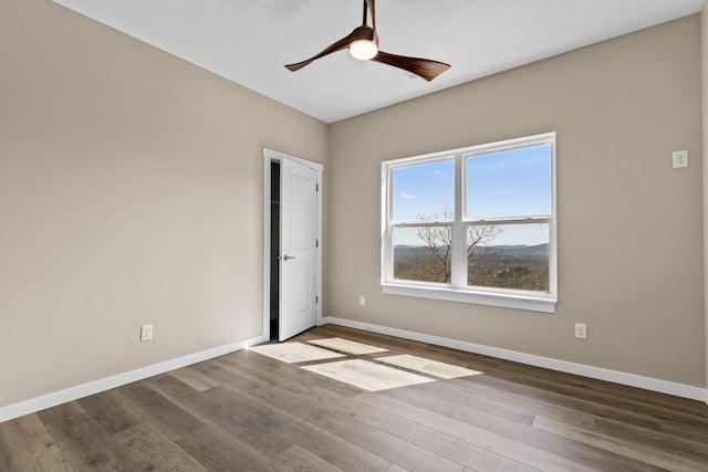 1186 Emory Creek Blvd, Branson, MO 65616 - empty room with baseboards, a ceiling fan, and wood finished floors