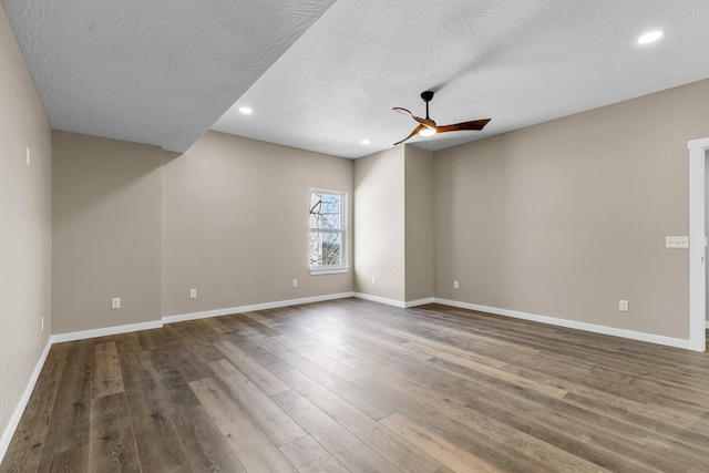 1186 Emory Creek Blvd, Branson, MO 65616 - unfurnished room with a ceiling fan, recessed lighting, baseboards, wood finished floors, and a textured ceiling