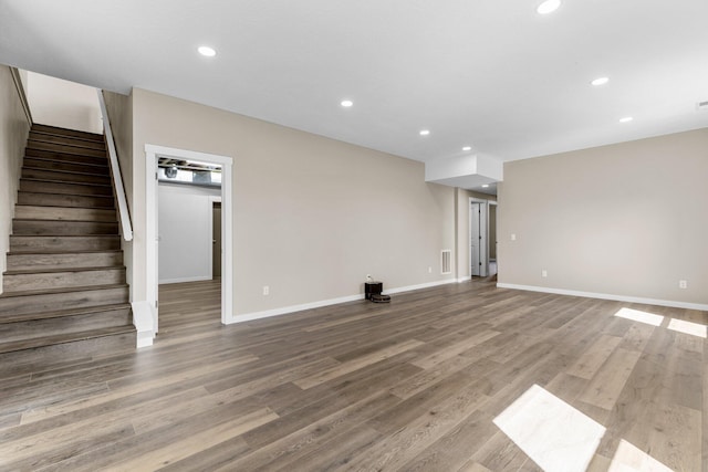 1186 Emory Creek Blvd, Branson, MO 65616 - unfurnished living room featuring recessed lighting, stairs, light wood-type flooring, and baseboards