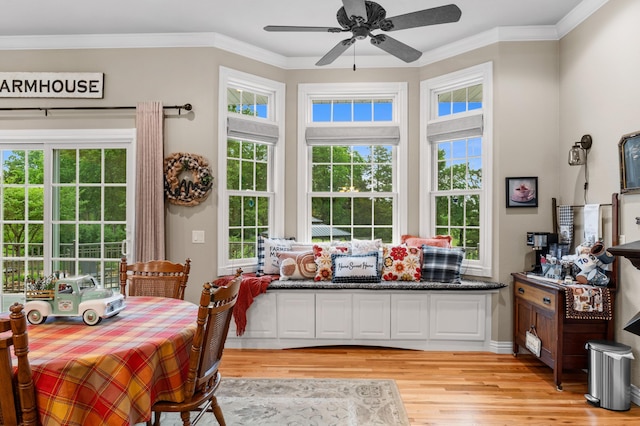 4266 S 94th Rd, Bolivar, MO 65613 - dining room featuring light wood finished floors, ceiling fan, and crown molding