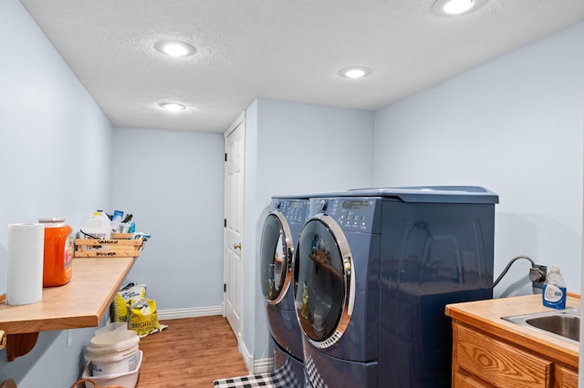 4266 S 94th Rd, Bolivar, MO 65613 - washroom featuring washer and dryer, wood finished floors, a textured ceiling, baseboards, and recessed lighting