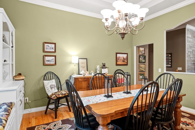 4266 S 94th Rd, Bolivar, MO 65613 - dining area with a chandelier, light wood-style flooring, baseboards, and ornamental molding