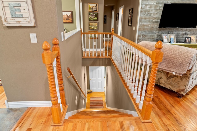 4266 S 94th Rd, Bolivar, MO 65613 - stairway with wood finished floors and baseboards