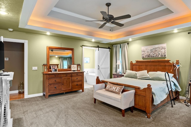 4266 S 94th Rd, Bolivar, MO 65613 - bedroom with a barn door, a raised ceiling, light colored carpet, and ensuite bath