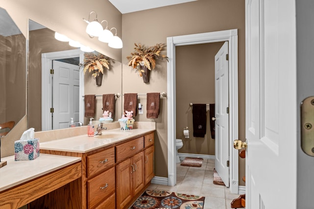 4266 S 94th Rd, Bolivar, MO 65613 - bathroom with tile patterned floors, vanity, toilet, and baseboards