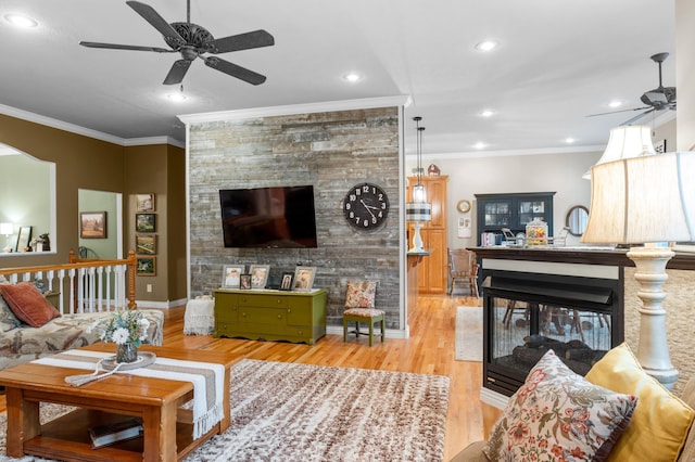 4266 S 94th Rd, Bolivar, MO 65613 - living area featuring a ceiling fan, a multi sided fireplace, crown molding, wood finished floors, and recessed lighting