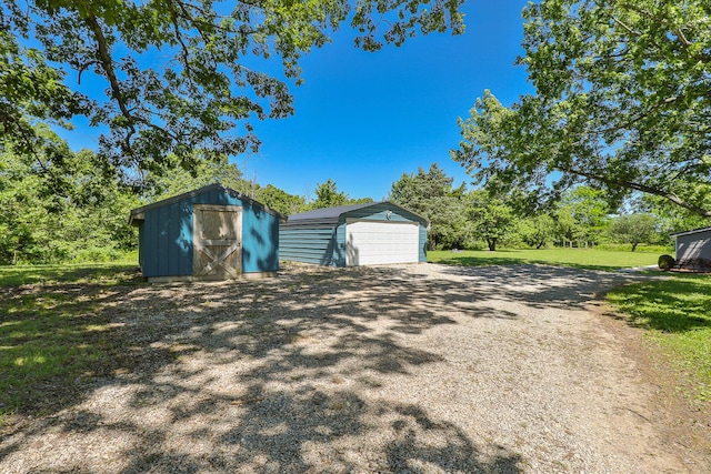 439 Union Chapel Rd, Fordland, MO 65652 - detached garage featuring a storage shed