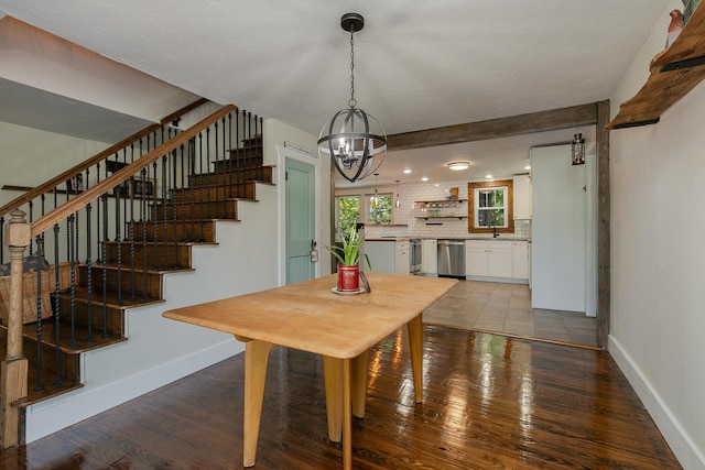 439 Union Chapel Rd, Fordland, MO 65652 - dining space featuring a chandelier, baseboards, stairway, dark wood-type flooring, and recessed lighting