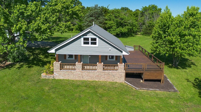 439 Union Chapel Rd, Fordland, MO 65652 - rear view of property featuring a yard and a wooden deck