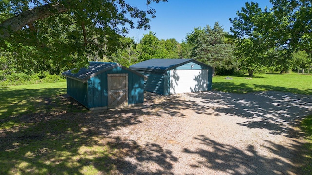 439 Union Chapel Rd, Fordland, MO 65652 - detached garage featuring a storage unit