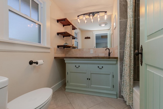 439 Union Chapel Rd, Fordland, MO 65652 - bathroom featuring toilet, backsplash, tile patterned floors, and vanity