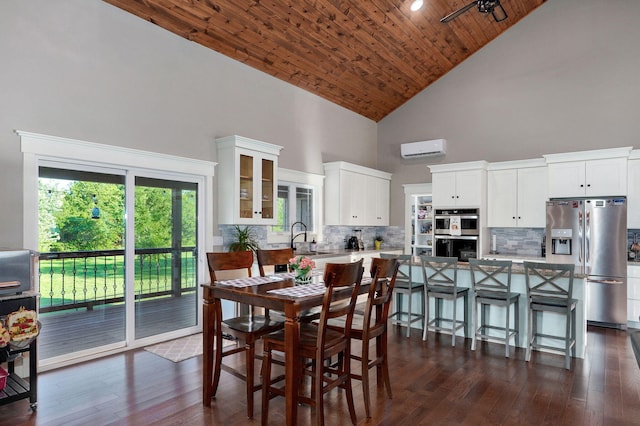 5116 S 165th Rd, Bolivar, MO 65613 - dining area featuring high vaulted ceiling, an AC wall unit, wood ceiling, and dark wood-style floors