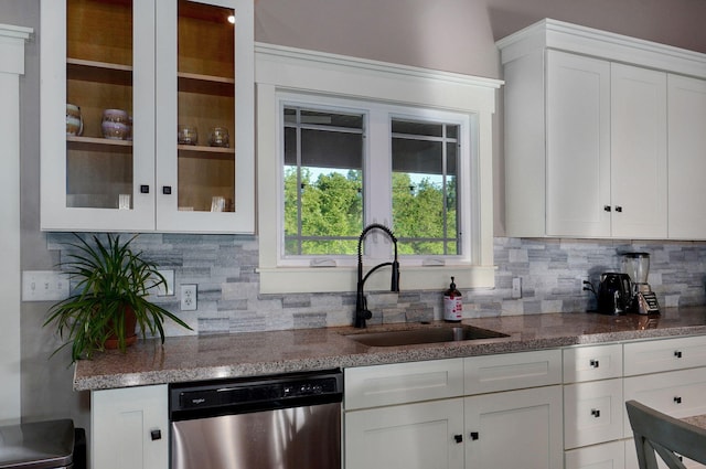 5116 S 165th Rd, Bolivar, MO 65613 - kitchen featuring dishwasher, a sink, white cabinetry, and decorative backsplash
