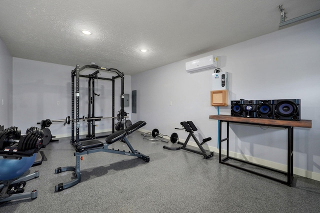 5116 S 165th Rd, Bolivar, MO 65613 - workout area featuring a wall unit AC, a textured ceiling, baseboards, and recessed lighting