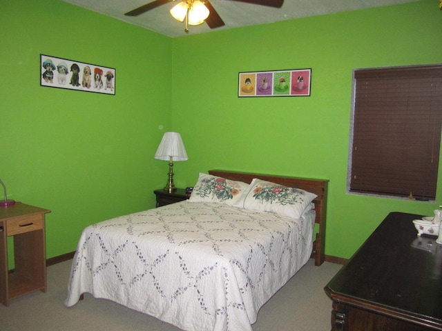 32880 Normal Dr, Eldridge, MO 65463 - carpeted bedroom featuring baseboards and a ceiling fan