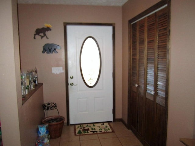 32880 Normal Dr, Eldridge, MO 65463 - foyer with light tile patterned flooring