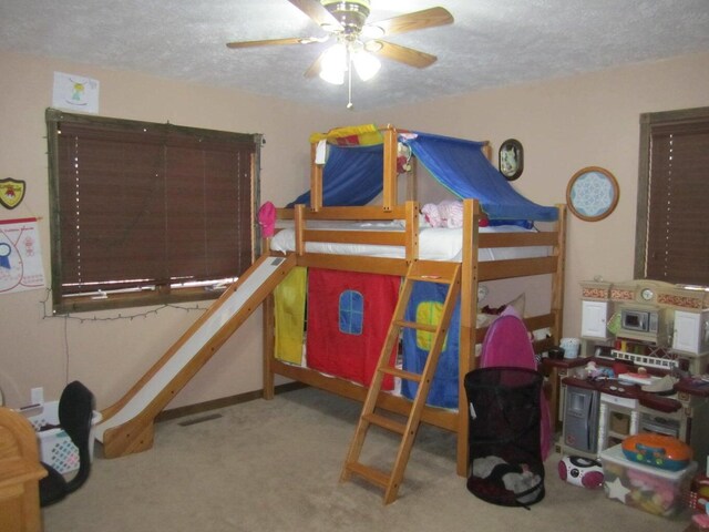 32880 Normal Dr, Eldridge, MO 65463 - bedroom featuring a textured ceiling and carpet floors