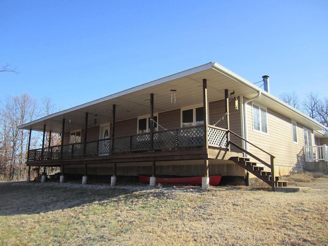 32880 Normal Dr, Eldridge, MO 65463 - back of property with a porch