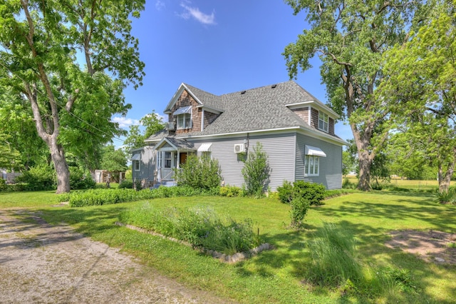 17381 Imperial Rd, Carthage, MO 64836 - view of side of property with roof with shingles and a yard
