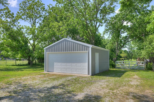 17381 Imperial Rd, Carthage, MO 64836 - detached garage featuring view of wooded area