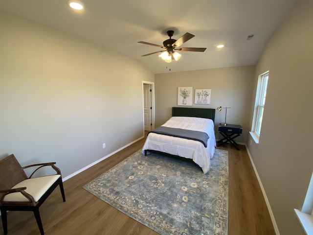 1221 Charlene Dr, Bolivar, MO 65613 - bedroom featuring wood finished floors, baseboards, lofted ceiling, a ceiling fan, and recessed lighting