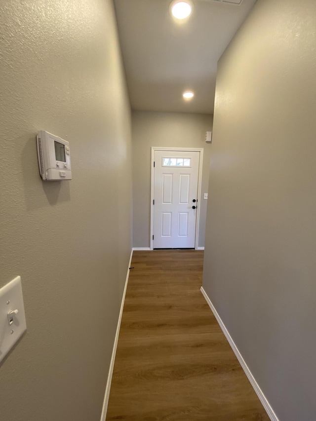 1221 Charlene Dr, Bolivar, MO 65613 - corridor with baseboards, wood finished floors, and recessed lighting