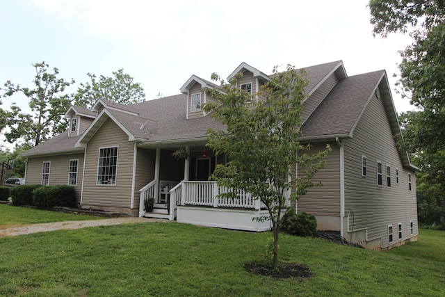 2362 Hazelwood Rd, Seymour, MO 65746 - new england style home with a porch, roof with shingles, and a front yard