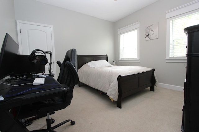 2362 Hazelwood Rd, Seymour, MO 65746 - bedroom with light colored carpet, multiple windows, an office area, and baseboards