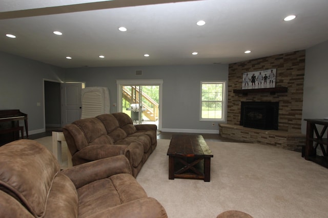 2362 Hazelwood Rd, Seymour, MO 65746 - living area with baseboards, recessed lighting, a fireplace, and light colored carpet