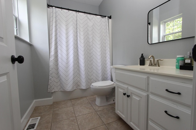 2362 Hazelwood Rd, Seymour, MO 65746 - full bathroom featuring vanity, toilet, tile patterned flooring, and shower / bathtub combination with curtain