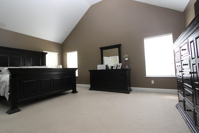 2362 Hazelwood Rd, Seymour, MO 65746 - bedroom with high vaulted ceiling, light carpet, and baseboards