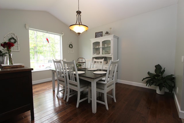 2362 Hazelwood Rd, Seymour, MO 65746 - dining area with vaulted ceiling, dark wood finished floors, and baseboards