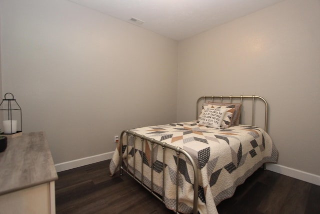 2362 Hazelwood Rd, Seymour, MO 65746 - bedroom with baseboards and dark wood-style flooring