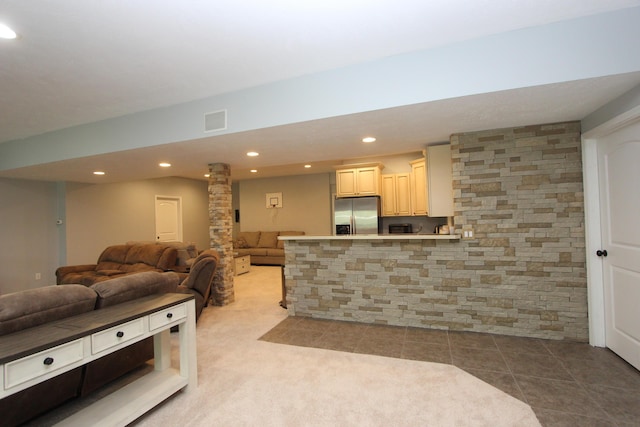 2362 Hazelwood Rd, Seymour, MO 65746 - living area with ornate columns, recessed lighting, carpet flooring, and tile patterned floors