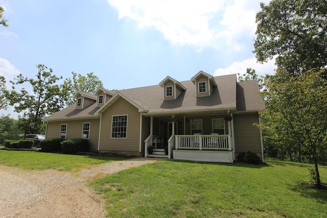 2362 Hazelwood Rd, Seymour, MO 65746 - cape cod home featuring a porch, a front lawn, and dirt driveway