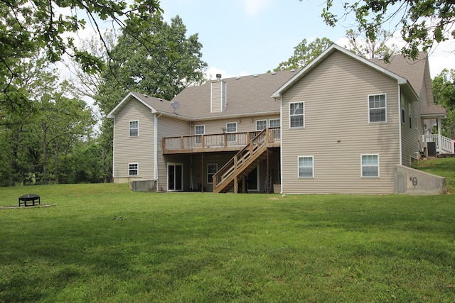 2362 Hazelwood Rd, Seymour, MO 65746 - rear view of property with stairway, a wooden deck, a lawn, a chimney, and roof with shingles