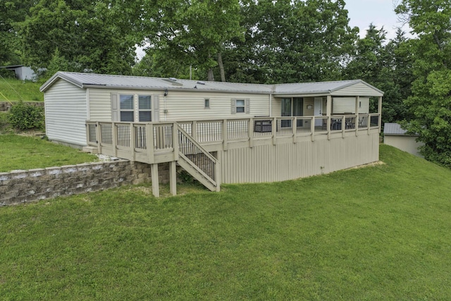 269 Moore Ln, Blue Eye, MO 65611 - back of property featuring a yard, stairway, a deck, and metal roof