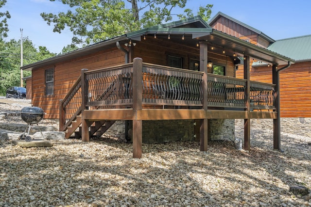 26 Cave Ln Unit 10, Indian Point, MO 65616 - back of house featuring a deck and metal roof