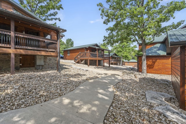 26 Cave Ln Unit 10, Indian Point, MO 65616 - view of yard featuring a deck