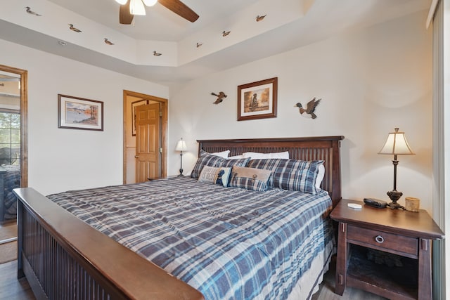 24 Village Trl Unit 13-2, Branson, MO 65616 - bedroom with a raised ceiling and a ceiling fan