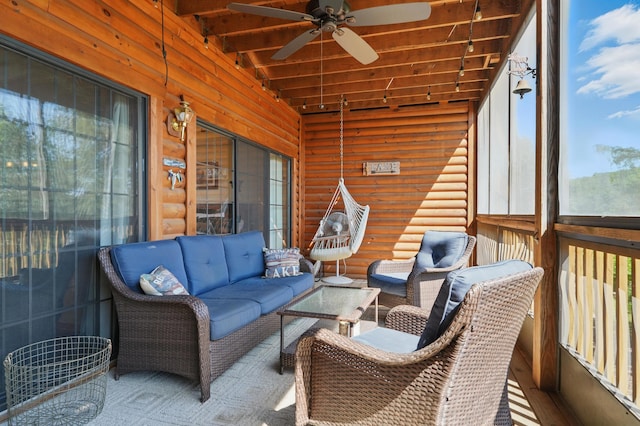24 Village Trl Unit 13-2, Branson, MO 65616 - sunroom / solarium featuring a ceiling fan, an outdoor hangout area, and beam ceiling