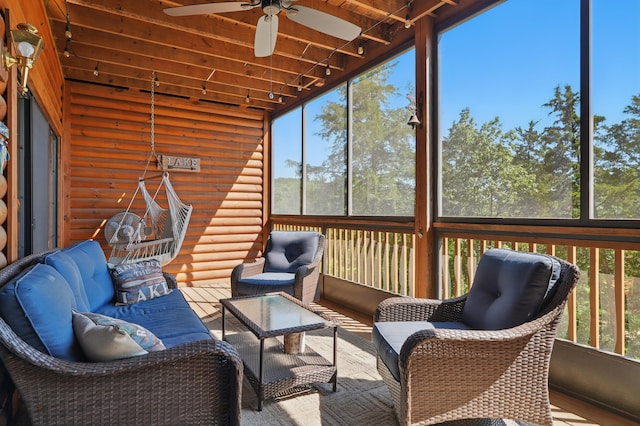 24 Village Trl Unit 13-2, Branson, MO 65616 - sunroom featuring ceiling fan and an outdoor hangout area