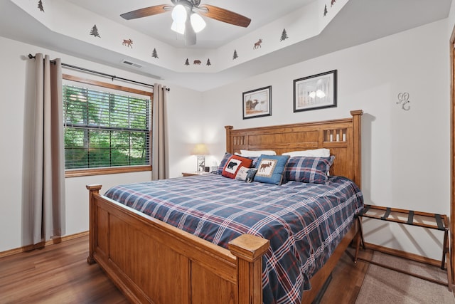 24 Village Trl Unit 13-2, Branson, MO 65616 - bedroom featuring wood finished floors, baseboards, and ceiling fan