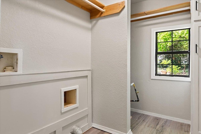 741 N Warren Ave, Springfield, MO 65802 - washroom with light wood-style floors, baseboards, and hookup for a washing machine